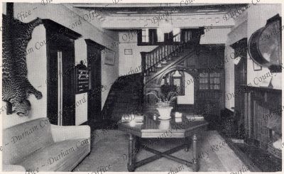 Photograph of a room and stairway in an...