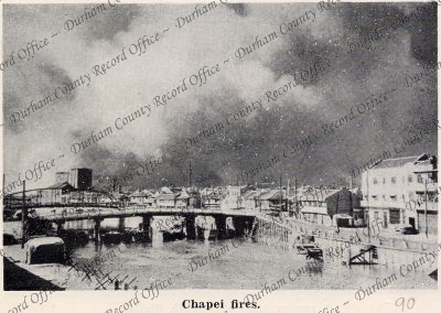 Photograph of fires within the Chapei a... Photograph of fires within the Chapei a...