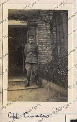 Photograph of an officer outside his bi...