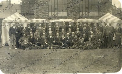 Photograph of group of men taken in fron... Photograph of group of men taken in fron...