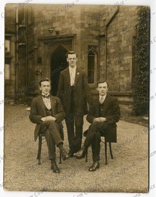 Formal photograph of three Bede students [prefects?], no names, n.d. [c. 1910]