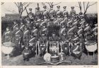 Group photograph of the band of the 1st Battalion, The Durham Light Infantry, taken at Shanghai, China, January 1938 
Back row: Bandsman Smurthwaite, Boy Taylor, Boy Kemp, Bandsman Rampling, Bandsman