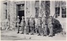 Photograph of soldiers of the 1st Battalion, The Durham Light Infantry, on guard duty at battalion headquarters, taken at Yu Yuen Road School, Shanghai, China, c.1938