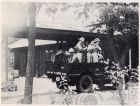 Photograph of soldiers of the 1st Battalion, The Durham Light Infantry, in the back of an army vehicle, about to begin guard duty, taken at Great Western Road, Shanghai, China, c.1938