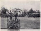 Photograph of soldiers of the 1st Battalion, The Durham Light Infantry, on a parade ground [possibly on completion of an annual inspection by Major-General A.P.D. Telfer-Smollet, Commander-in-Chief of