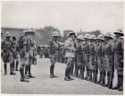 Photograph of Major-General A.P.D. Telfer-Smollet, Commander-in-Chief of the International Garrison in Shanghai, right, and unidentified officers, inspecting soldiers of 'D' Company, 1st Battalion, Th