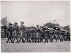 Photograph of soldiers of 'D' Company, 1st Battalion, The Durham Light Infantry, marching past the saluting post, during an annual inspection by Major-General A.P.D. Telfer-Smollet, Commander-in-Chief