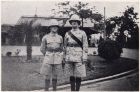 Photograph of Regimental Quartermaster-Sergeant Kirk, right, and an unidentified soldier, taken at Shanghai, China, c.1938