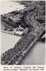 Photograph of refugees crossing the Garden Bridge, following the Japanese invasion, taken at Shanghai, China, 13 August 1938