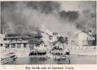 Photograph of fires on the north side of Soochow Creek, taken at Shanghai, China, August 1938