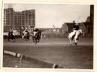 Photograph of polo players competing in a match [possibly taken in Shanghai, China, 1938]