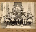Photograph of the football team of the 2nd Battalion, The Durham Light Infantry, winners of the Army Inter-Company Cup, Shanghai, China, 1927 
Back row: Hall, Whitfield, unidentified
Second row: Wil