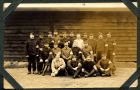 Photograph of a group of French soldiers, prisoners of war, at Rennbahn, Munster, Germany, endorsed: Souvenir de Mon Ami Boterf Jean Mar[ie] Barayan Nivilloce Par la Roche-Bernard Morbiham, c.1914-18
