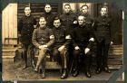 Photograph of an unidentified group of medical orderlies taken at Rennbahn prisoner of war camp, Munster, Germany, c.1916