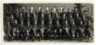 Group photograph of the officers of the 9th Battalion The Durham Light Infantry (7th Armoured Division, 131 Brigade) taken at Weert, Holland, prior to the Rhine crossing, 1945 
Includes: Captain Roy 
