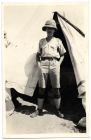 Photograph of a soldier, in tropical dress, standing in front of tent [Egypt], n.d., 1928