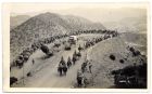Photograph of soldiers and pack horses on a mountain road, probably Razmak to Datta Khel, India, n.d., 1929