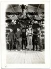 Photograph of seven soldiers in a mess hall with Christmas decorations, Mustapha, Egypt, 1929