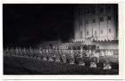 Photograph of physical training display of 1st Battalion, The Durham Light Infantry, by floodlight, York Military Tattoo, Yorkshire, 1933