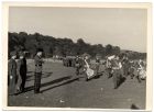 Photograph of a band, possibly that of the 19th Cadet Battalion, The Durham Light Infantry, on march past, Durham racecourse, n.d., [pre 1950]