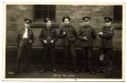 Photograph of a corporal and four privates, new recruits, captioned 'Happy New Year', n.d., [December 1921]