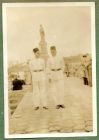 Photograph of two Egyptian policemen, taken at Port Said, Egypt, which also shows the monument to Ferdinand Lesseps, the engineer of the Suez Canal [1], 1937