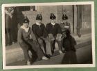 Photograph of four soldiers of the 1st Battalion, The Durham Light Infantry, wearing Tientsein fur-lined hats [possibly including H.C.R. Lees], captioned Tientsein [China], [32], 1938