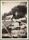 Photograph of a lady in a boat, captioned Irenee Von Trenberg on lake in Pei Hai Park, Peking [China] [56], c.1939