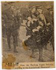 Newspaper cutting, containing a photograph of a wreath-laying party of The Durham Light Infantry, including 'Leslie', marked, at Sunderland War Memorial, n.d., [1920s]