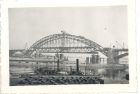 Photograph of a view of the Nijmegen Bridge over the River Waal, taken in Holland, September 1944