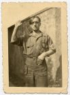 Photograph of a soldier in Nazi uniform, possibly a British soldier impersonating Hitler, n.d., [1945]