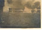 Photograph of the burning of a hut at Belsen concentration camp, Germany, n.d., [20 May 1945]