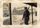 Photograph of a soldier of the 6th Battalion The Durham Light Infantry on sentry duty in Bensham, Gateshead, n.d. [winter 1914 - 1915]
