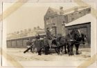 Photograph of soldiers of the 6th Battalion The Durham Light Infantry with battalion horse-drawn transport in the snow, Bensham Billets, Gateshead, n.d. [1914 - 1915]