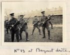 Photograph of soldiers of the 6th Battalion The Durham Light Infantry training at Bensham Billets, Gateshead, captioned: No. 13 at Bayonet Drill, n.d. [1914 - 1915]