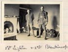 Photograph of two officers their billets captioned: Second Lieutenant Leighton and Second Lieutenant Blenkinsop both of 'A' Company, 6th Battalion The Durham Light Infantry, n.d. [1914 - 1915]