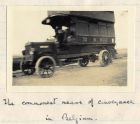 Photograph of a civilian bus commandeered for military use, captioned: The commonest means of conveyance in Belgium, n.d. [1915]
