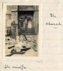 Photograph of soldier beside shell-damaged church, captioned: Valmertinghe, The Church, The Crucifix, Belgium, n.d. [June 1915]
