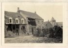 Photograph of ruined houses, captioned: Kemmel, ruins in the village, Belgium, n.d. [1915]