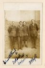 Photograph of four officer prisoners with their names signed on the bottom of the photograph, Graudenz, West Prussia, Germany, n.d. [November 1918]