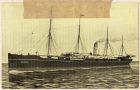 Postcard photograph of the transport ship [BIRMA] used to return prisoners of war, including P.H.B. Lyon, from Gdansk [Danzig], Poland to Leith in Scotland, captioned: The 'Mitau' as it was when it wa