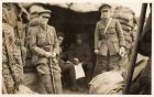 Photograph of unidentified officers of the 6th Battalion The Durham Light Infantry in a dugout, [Ypres, Belgium] n.d. [1915]