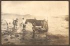 Photograph of local people washing their horses in St. Julian's Bay, Malta, n.d. [ c.1916]