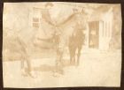 Photograph of a woman on horseback outside Park House, Appledore, Kent, n.d. [1916]