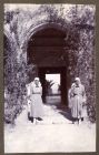 Photograph of two nurses, Miss Corner and Miss Dickson, beside an arched doorway at Imtarfa, Malta, August 1918