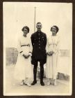 Photograph of Connie McBain, Hubert McBain, and May McBain standing on the roof of 'The Haven', the parental home, Malta, n.d. [1918]