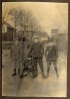 Photograph of four German or 'Bosche' Boys playing on the ice and snow, Lechenich, Germany, January 1919