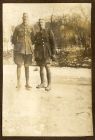 Photograph of Hubert McBain and Lieutenant Arderne (D.L.I.) ice skating on the moat of the Schloss, Lechenich, Germany, January 1919