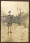 Photograph of Second Lieutenant Hubert McBain standing on the ice of the moat, Lechenich, Germany, January 1919