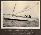 Photograph of Connie McBain, Mrs. Ferguson, and 'Nic' aboard a sailing boat off Dragonara, Malta, n.d. [ c.1919]